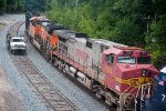 BNSF 705 and 46A bringss thr grain past the NECR MOW